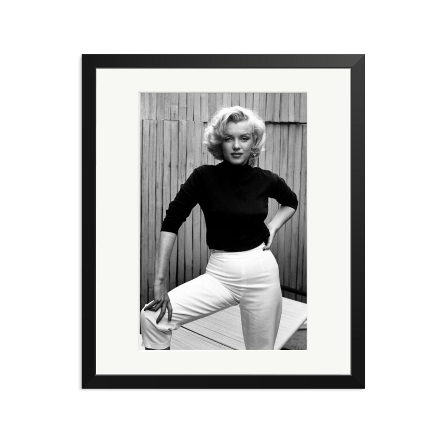 Marilyn Monroe Posing on Her Patio Framed Print