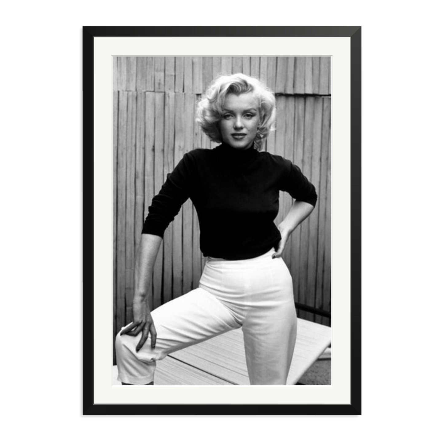 Marilyn Monroe Posing on Her Patio Framed Print