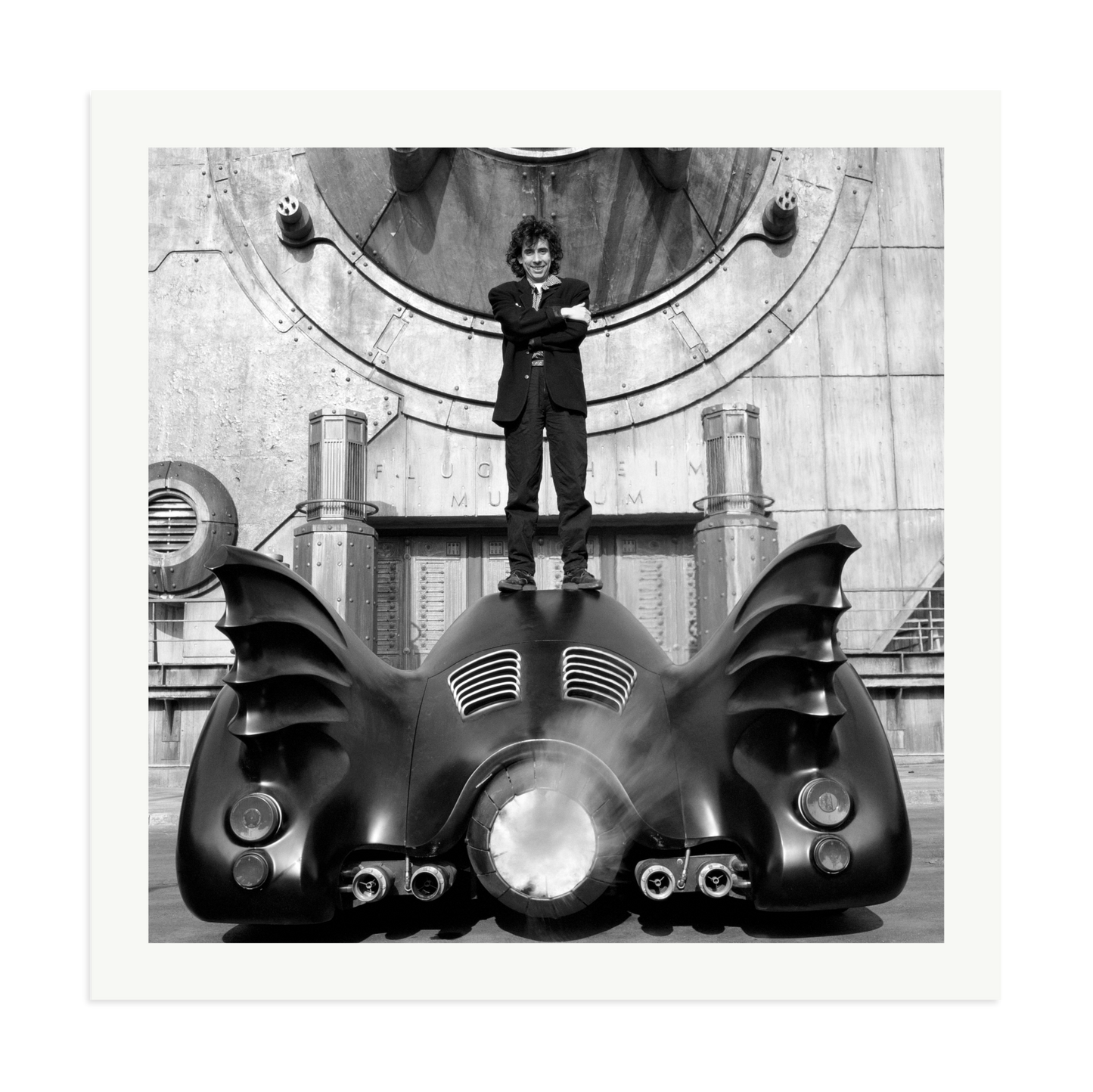 Tim Burton on The Batmobile Framed Print