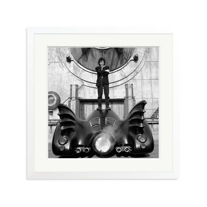 Tim Burton on The Batmobile Framed Print