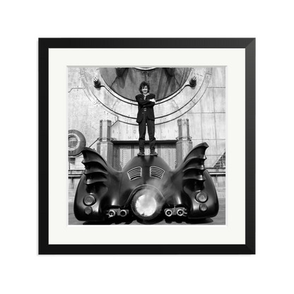 Tim Burton on The Batmobile Framed Print