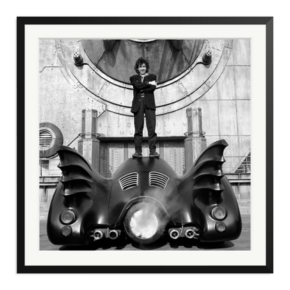 Tim Burton on The Batmobile Framed Print