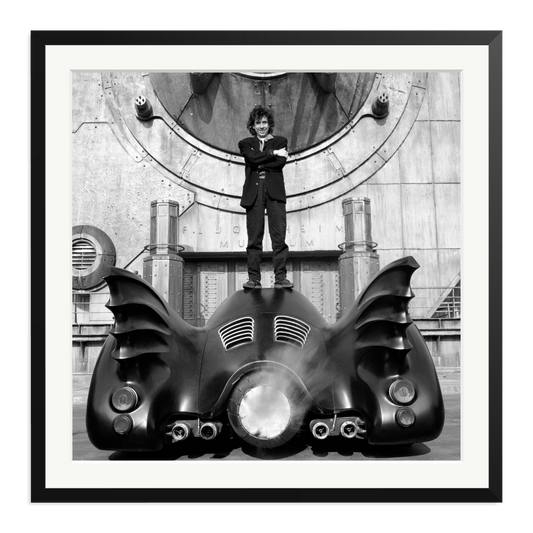 Tim Burton on The Batmobile Framed Print