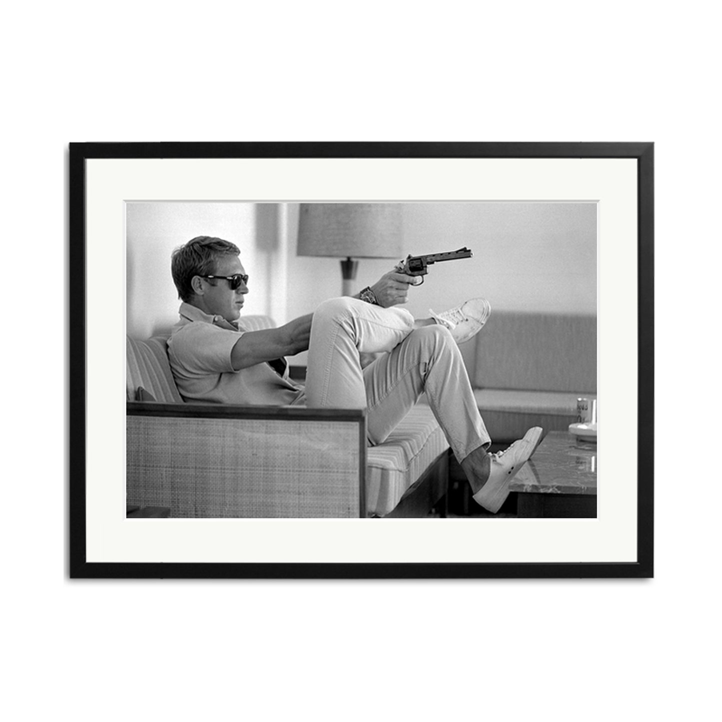 Steve McQueen Aims a Pistol Framed Print