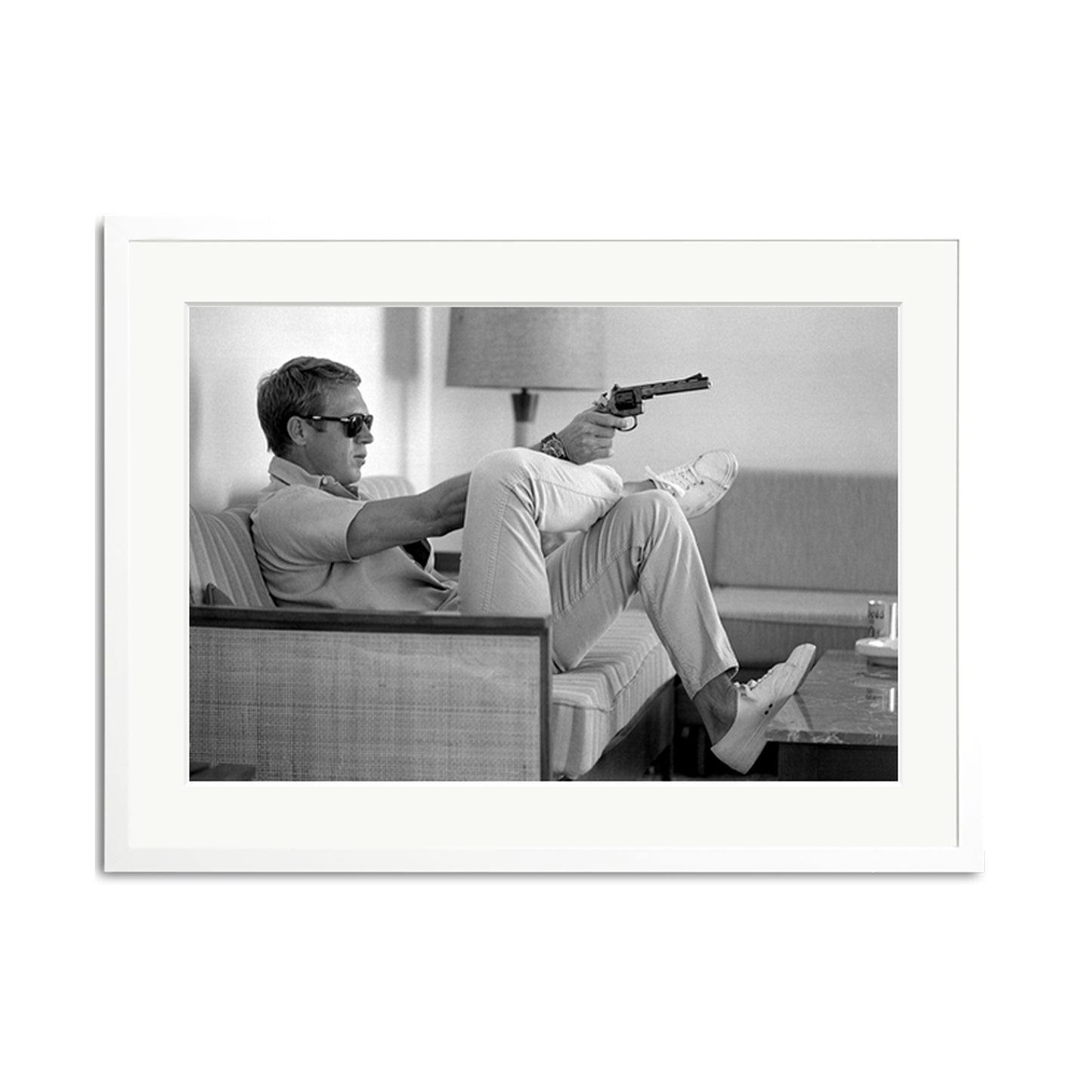 Steve McQueen Aims a Pistol Framed Print