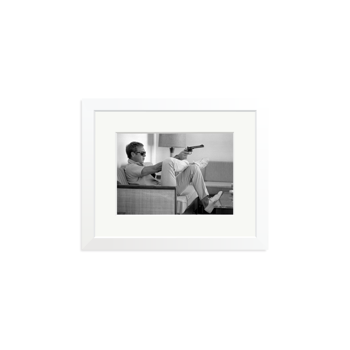 Steve McQueen Aims a Pistol Framed Print