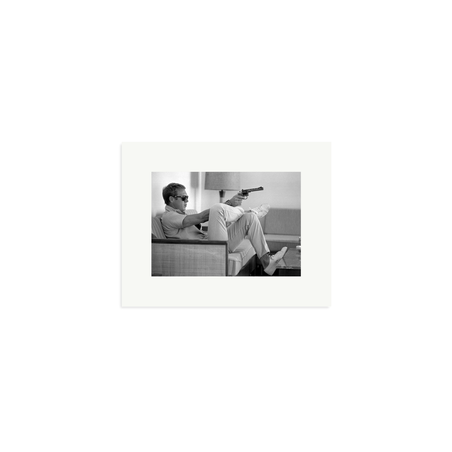 Steve McQueen Aims a Pistol Framed Print
