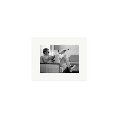 Steve McQueen Aims a Pistol Framed Print