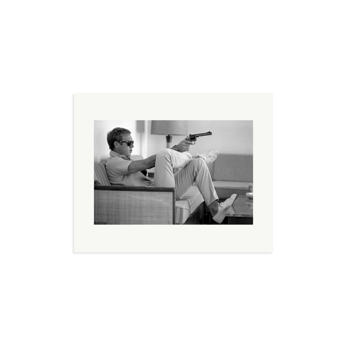 Steve McQueen Aims a Pistol Framed Print