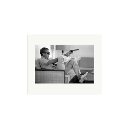 Steve McQueen Aims a Pistol Framed Print