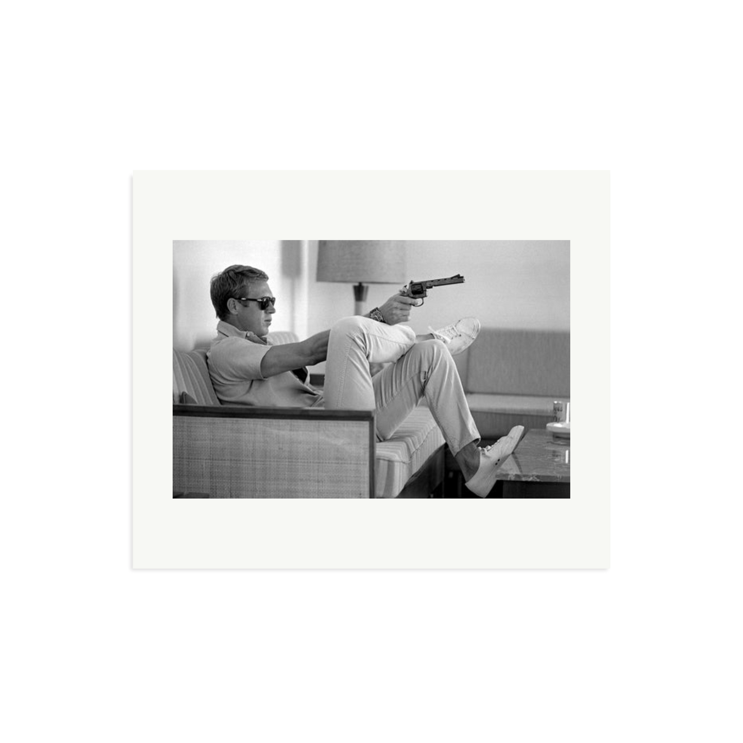 Steve McQueen Aims a Pistol Framed Print