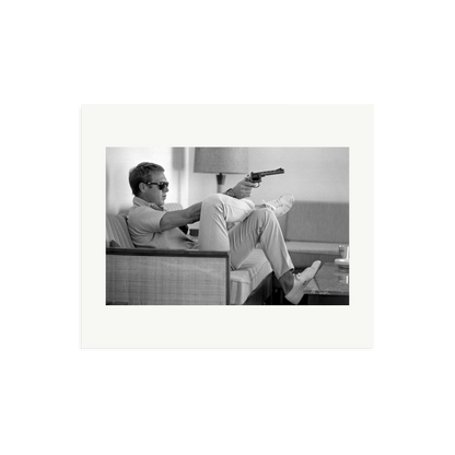 Steve McQueen Aims a Pistol Framed Print