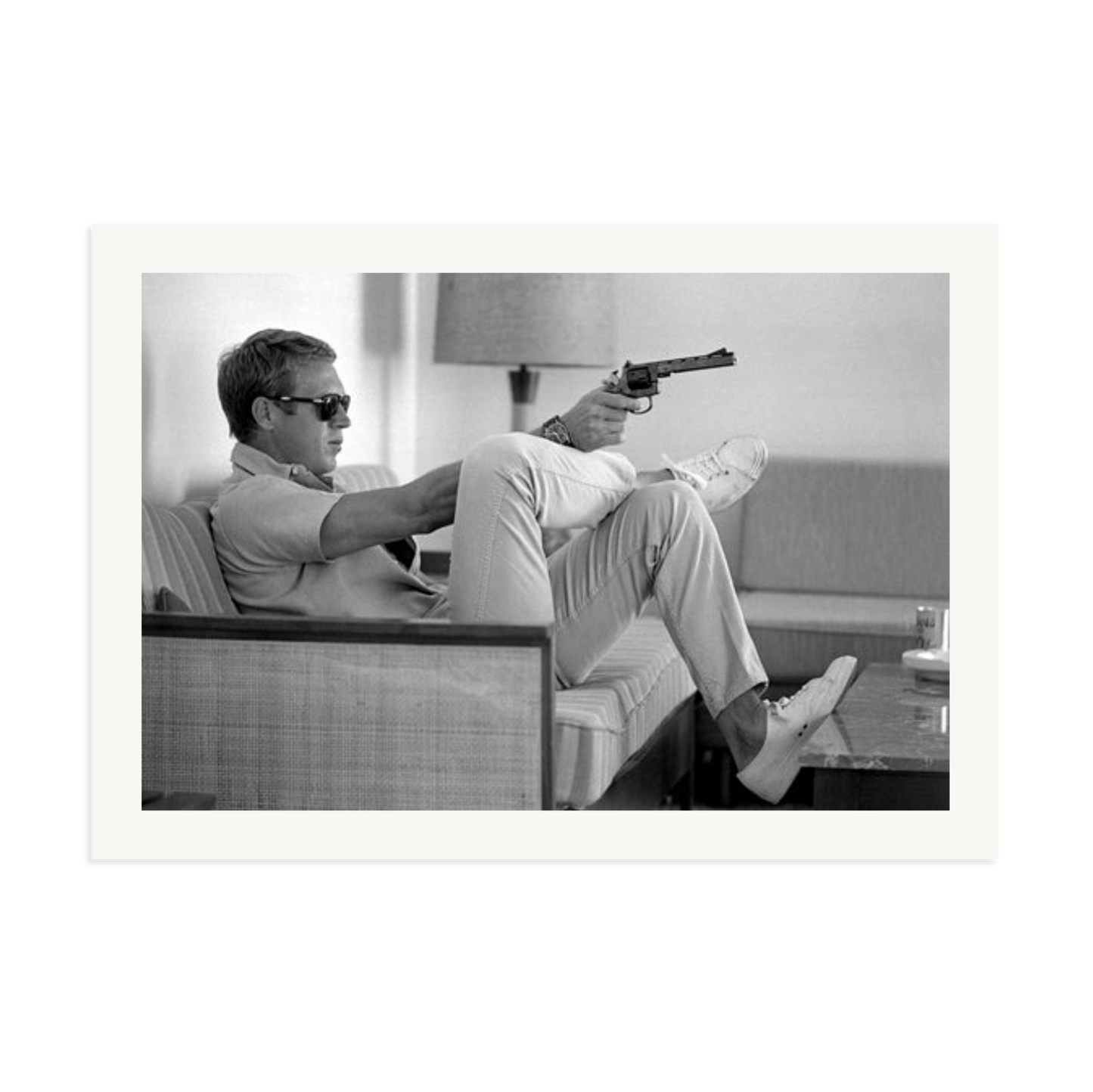 Steve McQueen Aims a Pistol Framed Print