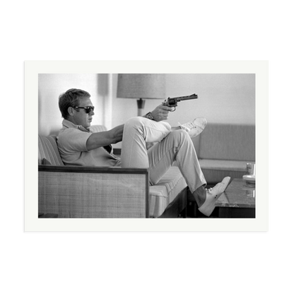 Steve McQueen Aims a Pistol Framed Print