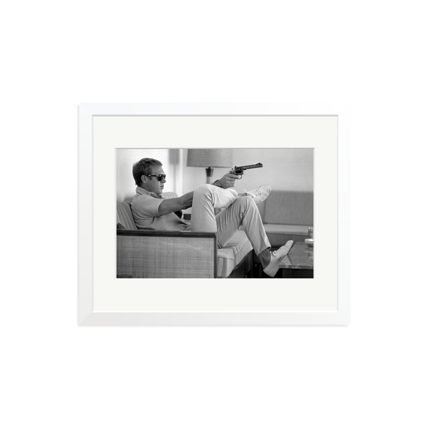 Steve McQueen Aims a Pistol Framed Print