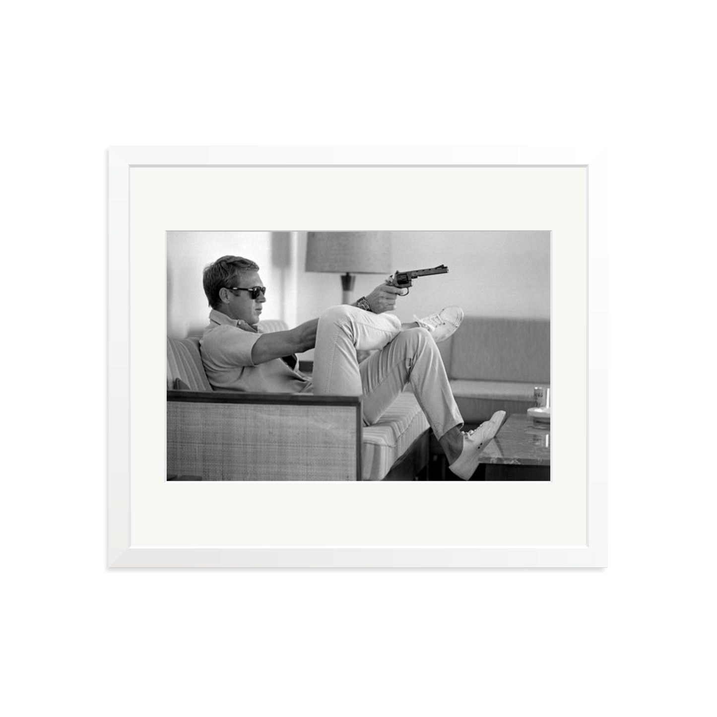 Steve McQueen Aims a Pistol Framed Print