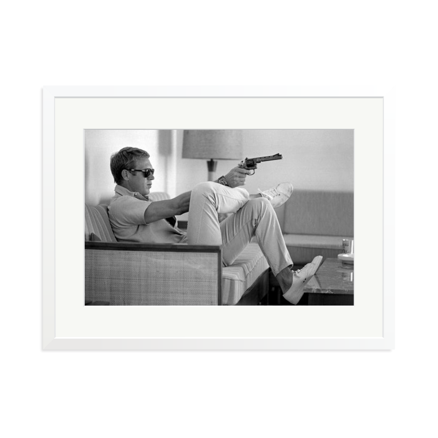 Steve McQueen Aims a Pistol Framed Print