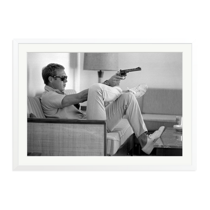Steve McQueen Aims a Pistol Framed Print