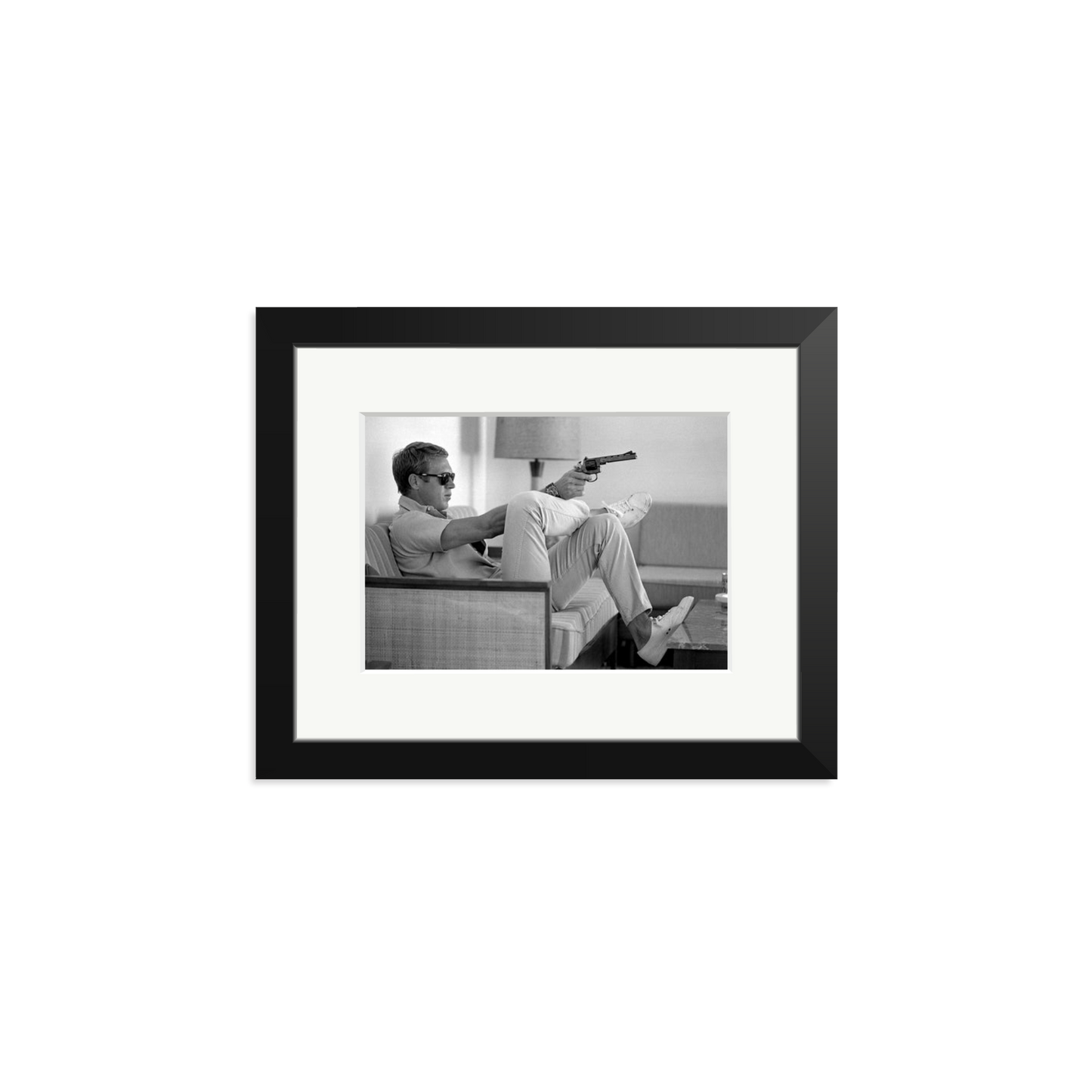 Steve McQueen Aims a Pistol Framed Print