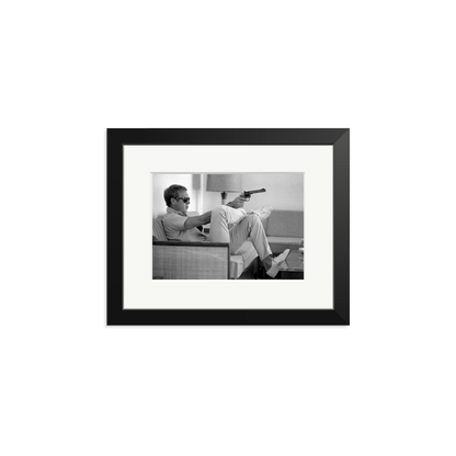 Steve McQueen Aims a Pistol Framed Print