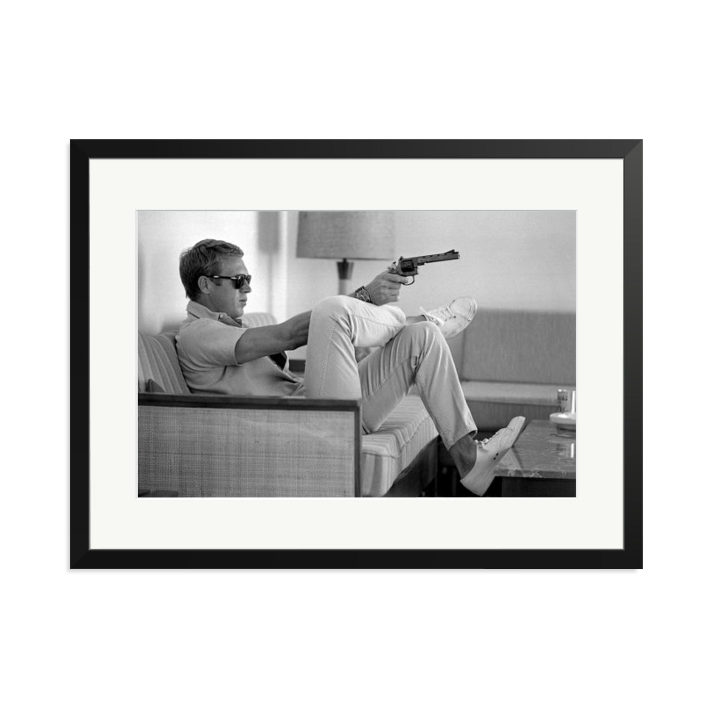 Steve McQueen Aims a Pistol Framed Print