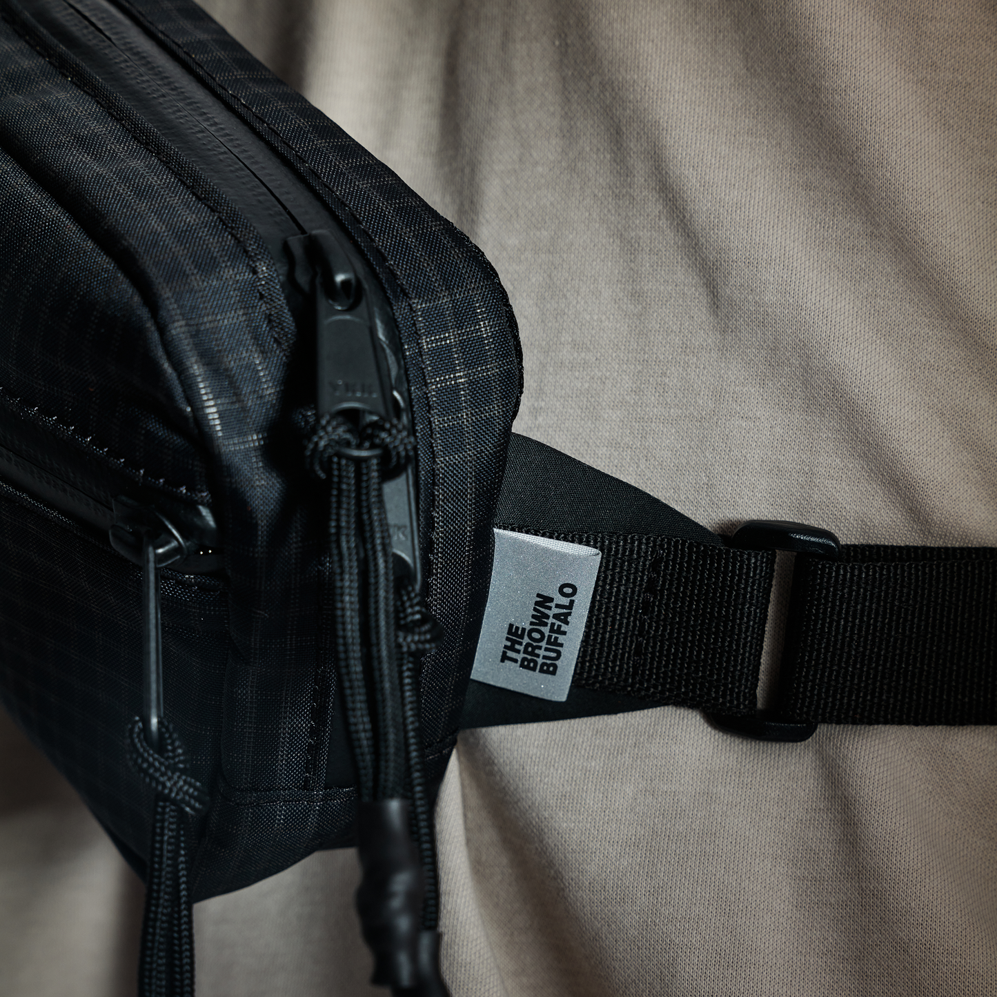 The Brown Buffalo Conceal Black Grid Waistpack