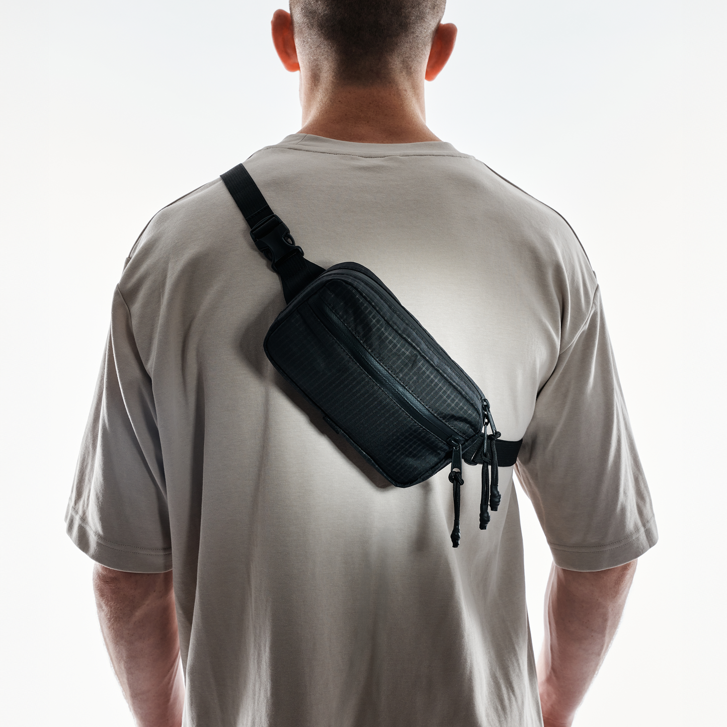 The Brown Buffalo Conceal Black Grid Waistpack