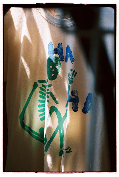 the "last laugh" tee