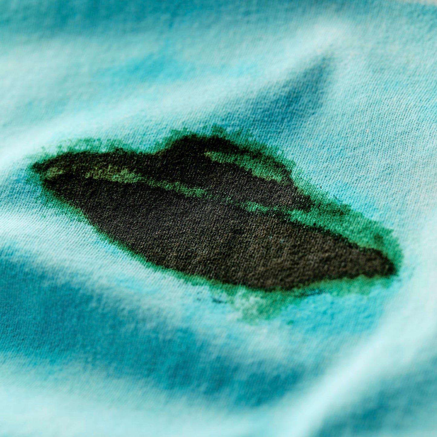 the "believe" tee
