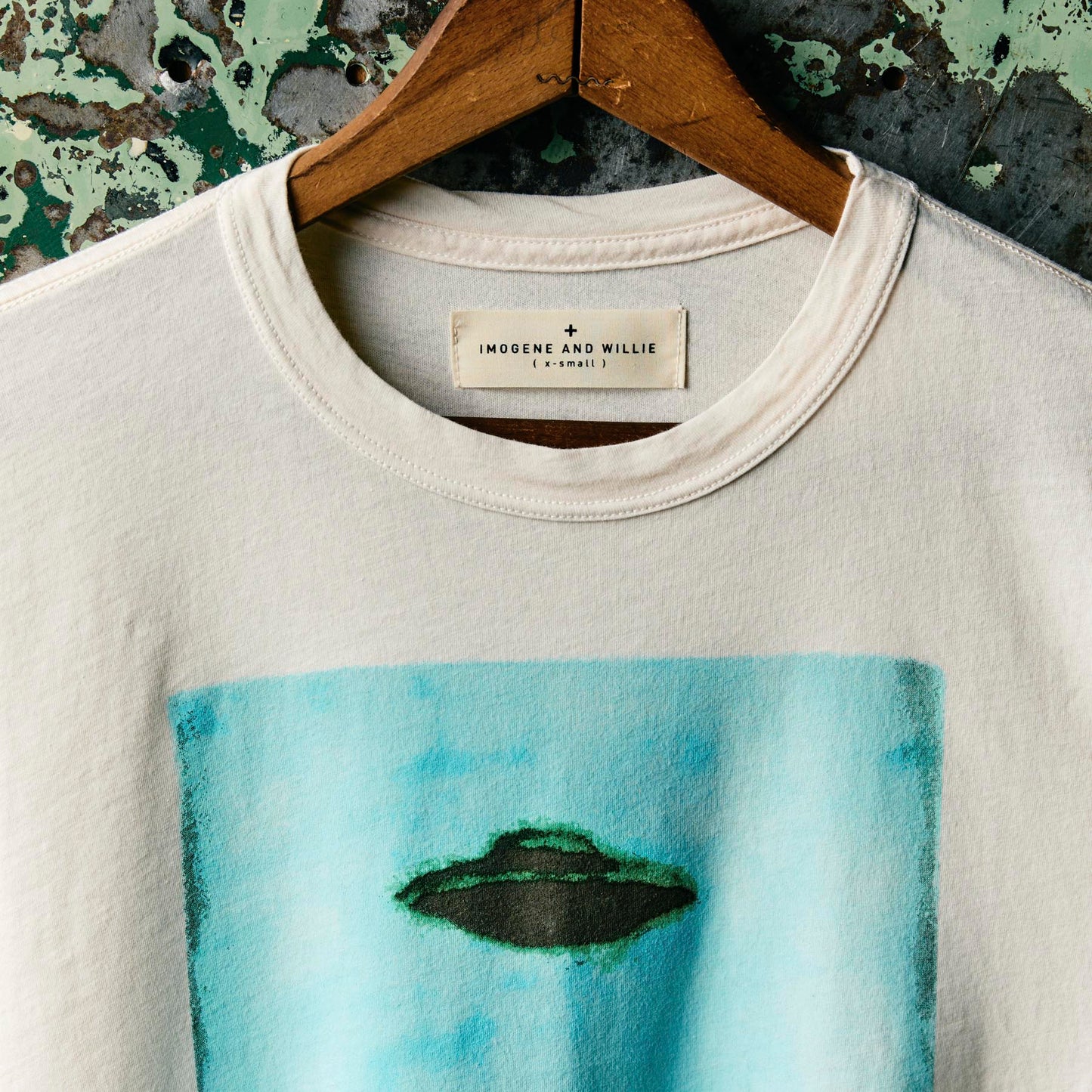 the "believe" tee