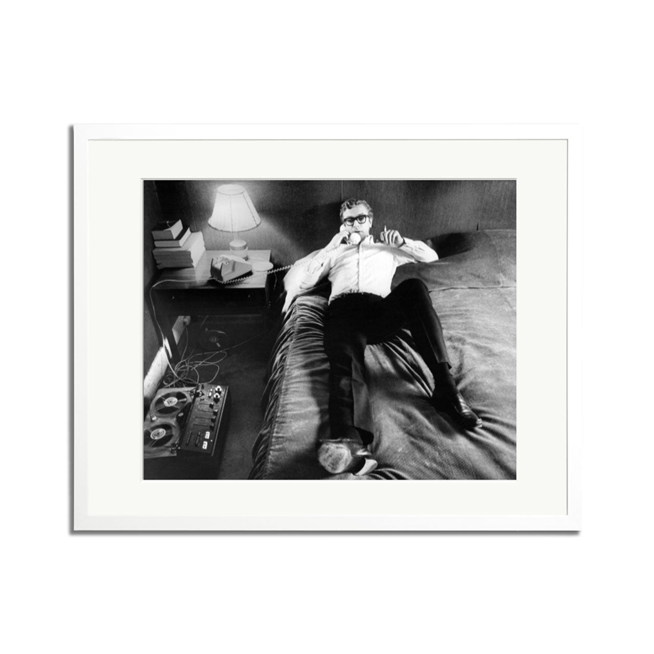 Michael Caine on the Phone Framed Print